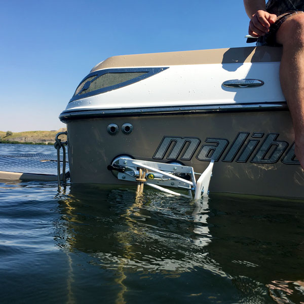 We found that mounting lower than this, essentially 3-4" under the waterline is more effective.